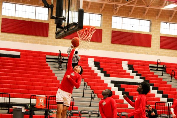junior varsity Sophmore Justin Sosa  making a lay up