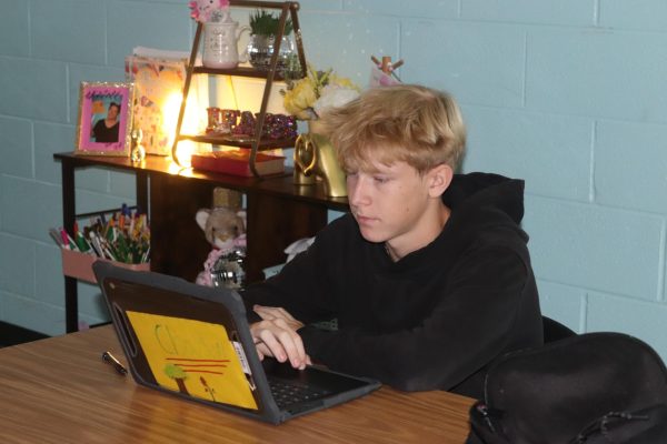 Sophomore Jameson Cox tackling his English STAAR prep